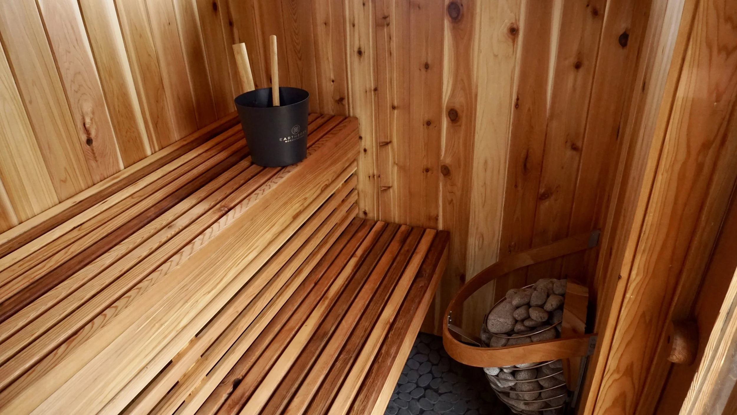 Multi-tiered cedar benches with heater and Earthborn bucket